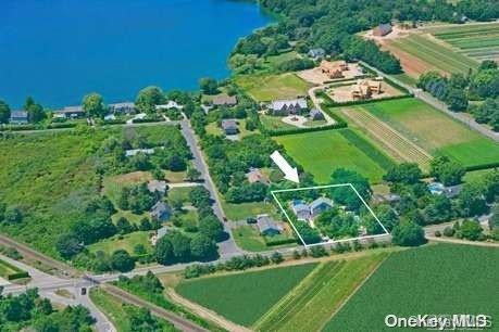 aerial view featuring a rural view and a water view