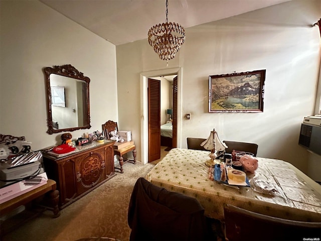 bedroom featuring carpet flooring and a chandelier