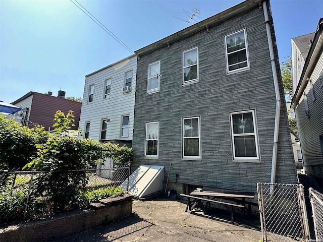 rear view of house featuring a patio area