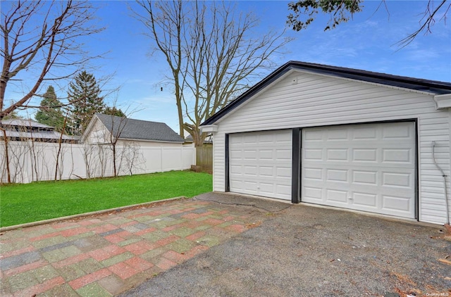 garage with a lawn