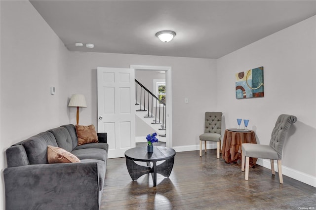 living room with dark hardwood / wood-style floors