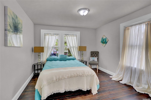 bedroom featuring dark wood-type flooring