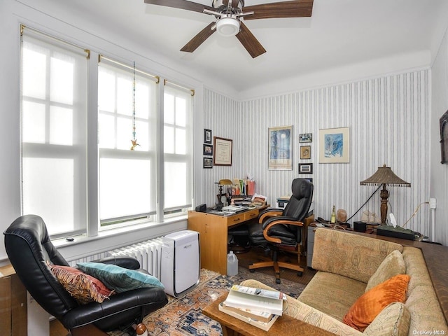 home office featuring radiator heating unit and ceiling fan