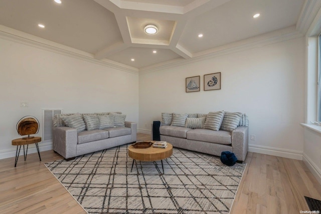 living room with wood-type flooring and ornamental molding