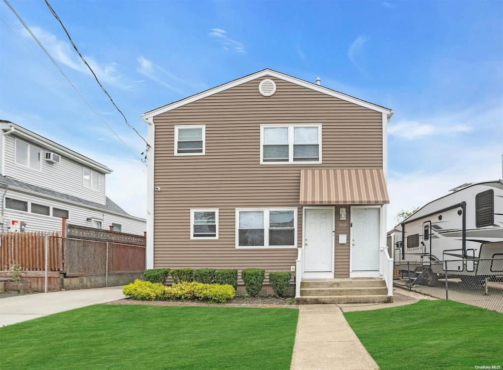 view of front of house with a front yard