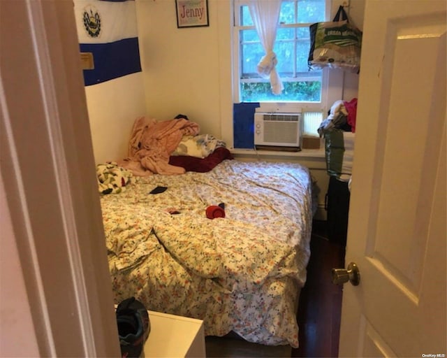 bedroom with cooling unit