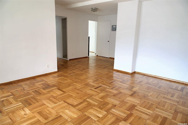 empty room with light parquet floors