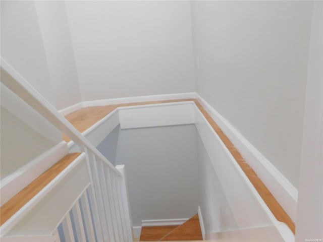 stairs featuring tile patterned flooring