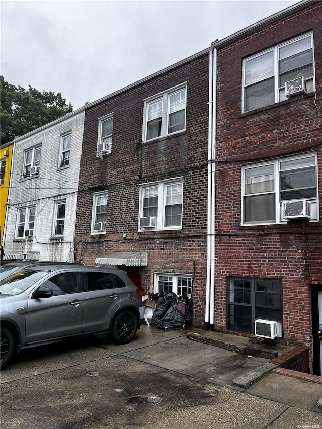 view of front of home with cooling unit