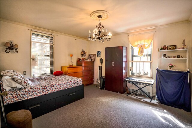 bedroom with multiple windows, crown molding, carpet floors, and a chandelier