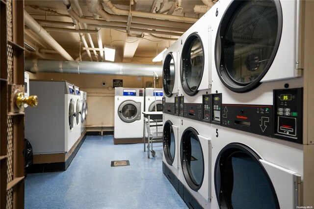 washroom with stacked washing maching and dryer and separate washer and dryer