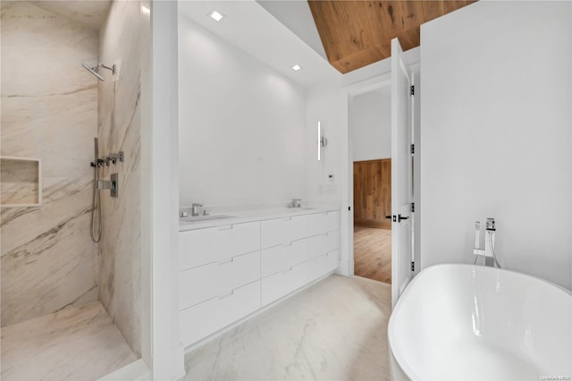 bathroom featuring sink, plus walk in shower, and vaulted ceiling