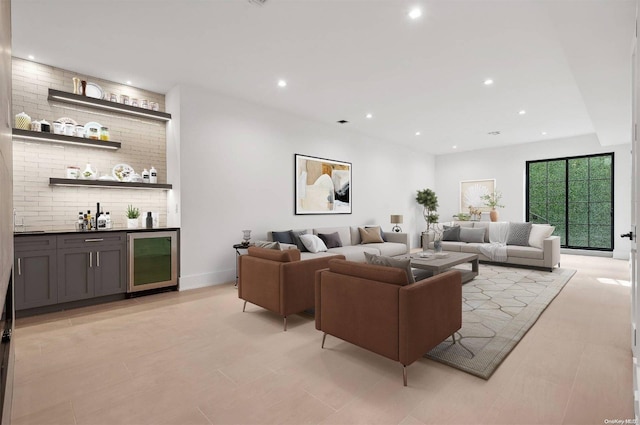 living room featuring bar area and wine cooler