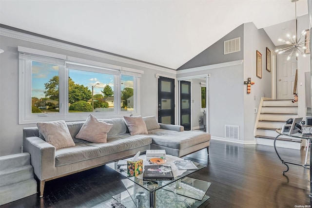 living room featuring crown molding, dark hardwood / wood-style flooring, high vaulted ceiling, and a chandelier