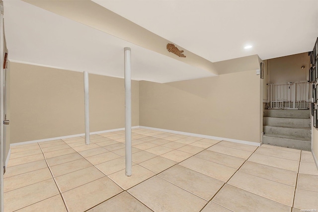 basement with light tile patterned floors