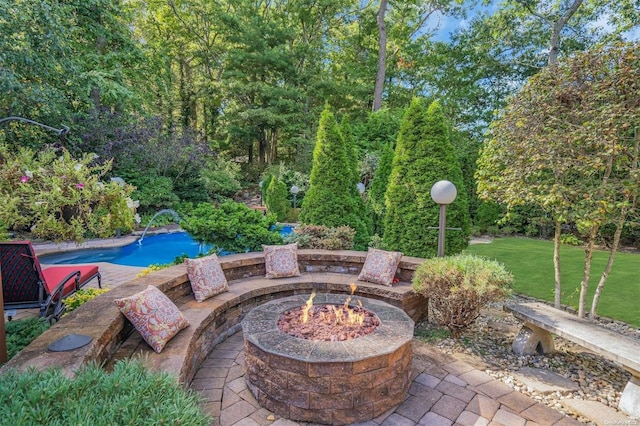 view of patio / terrace featuring a fire pit