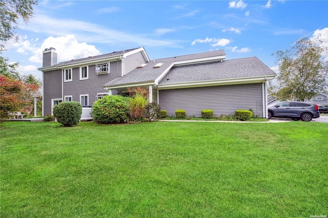 view of home's exterior featuring a yard