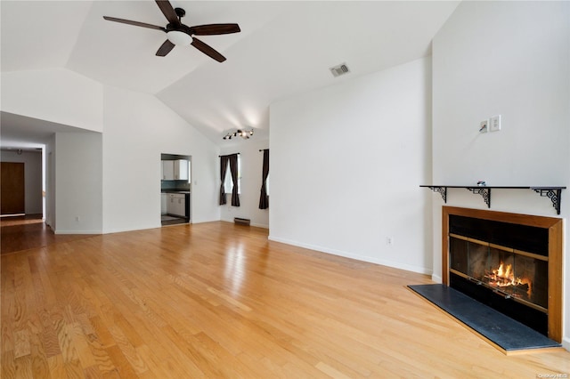 unfurnished living room featuring ceiling fan, high vaulted ceiling, and hardwood / wood-style flooring