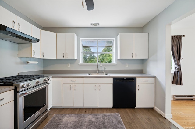 kitchen with white cabinetry, dark hardwood / wood-style floors, high end stainless steel range oven, and black dishwasher