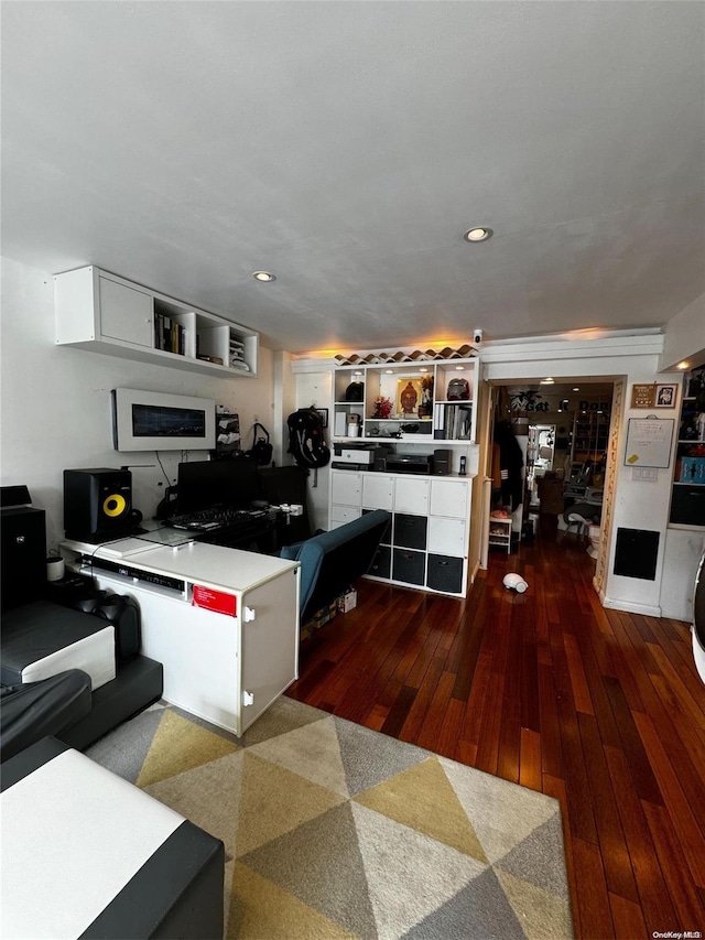 kitchen with white cabinetry and dark hardwood / wood-style flooring