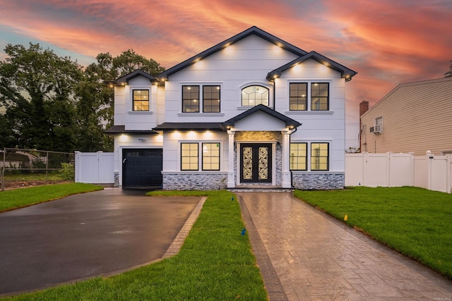 12 Hoover Ln, Bethpage, NY 11714 - view of front of property with stone siding, a garage, and driveway