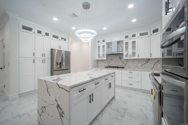 12 Hoover Ln, Bethpage, NY 11714 - kitchen with stainless steel appliances, wall chimney range hood, light marble finish flooring, a chandelier, and recessed lighting