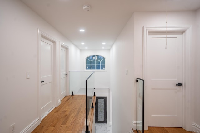 12 Hoover Ln, Bethpage, NY 11714 - hallway with light wood finished floors and recessed lighting