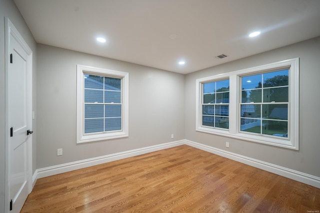 12 Hoover Ln, Bethpage, NY 11714 - spare room with light wood finished floors and recessed lighting