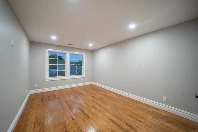 12 Hoover Ln, Bethpage, NY 11714 - spare room featuring light wood-style flooring and recessed lighting