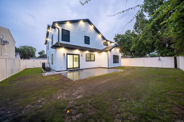 12 Hoover Ln, Bethpage, NY 11714 - back of property featuring a patio area, a gate, and a fenced backyard