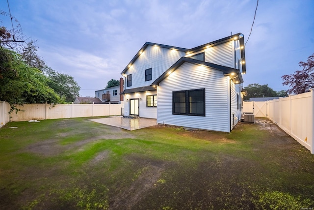 12 Hoover Ln, Bethpage, NY 11714 - rear view of property with a patio and a fenced backyard