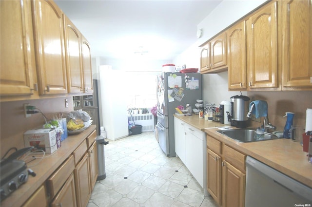 kitchen featuring stainless steel appliances and sink