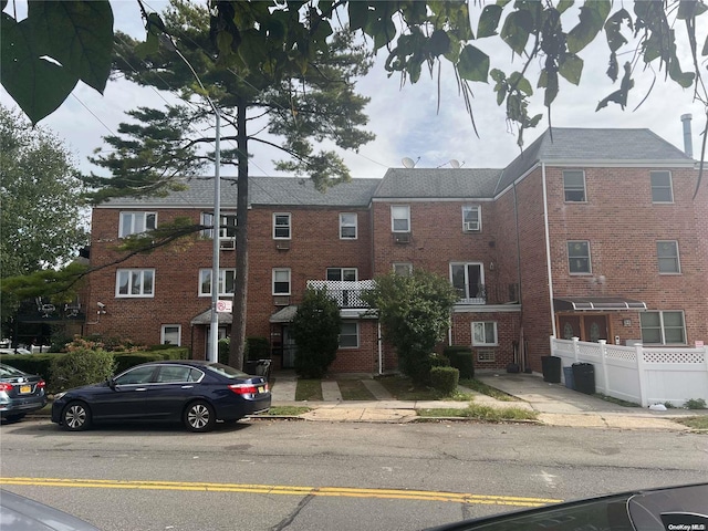 view of property featuring central air condition unit