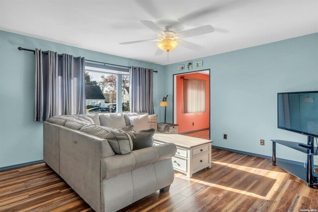 21 Fern Ter, West Babylon, NY 11704 - living room with a ceiling fan and wood finished floors
