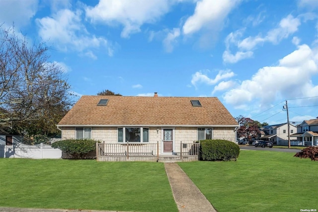 view of front facade with a front lawn