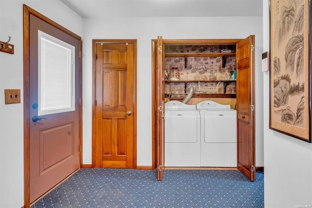 laundry area with washing machine and dryer