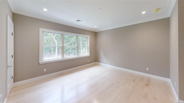 spare room with light wood-type flooring