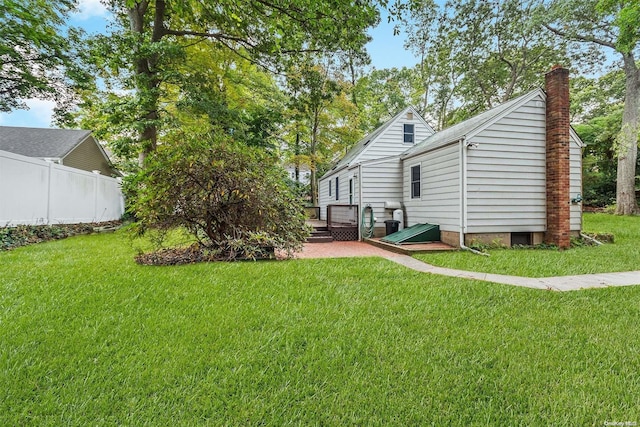 view of yard with a wooden deck