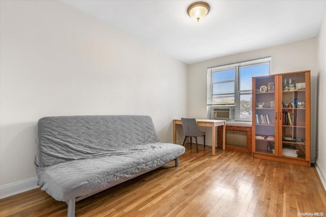 sitting room featuring light hardwood / wood-style flooring