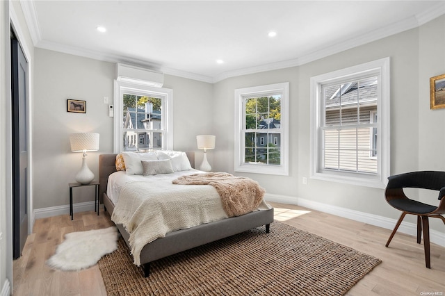 bedroom featuring light wood-type flooring, an AC wall unit, multiple windows, and crown molding