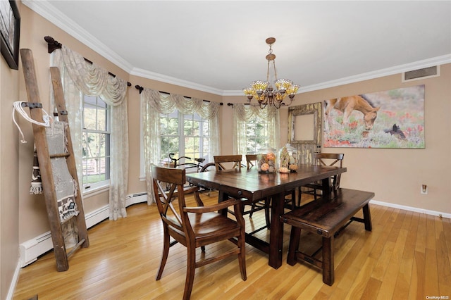 dining area with crown molding, light hardwood / wood-style flooring, a chandelier, and a baseboard radiator