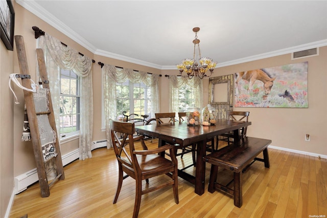 11A Sunken Meadow Rd Unit A, Northport, NY 11768 - dining room with a chandelier, light wood finished floors, crown molding, baseboards, and a baseboard heating unit