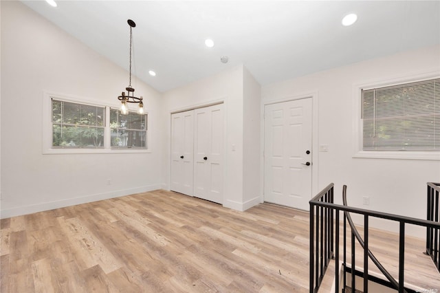 11A Sunken Meadow Rd Unit A, Northport, NY 11768 - foyer entrance featuring recessed lighting, light wood-type flooring, baseboards, and vaulted ceiling