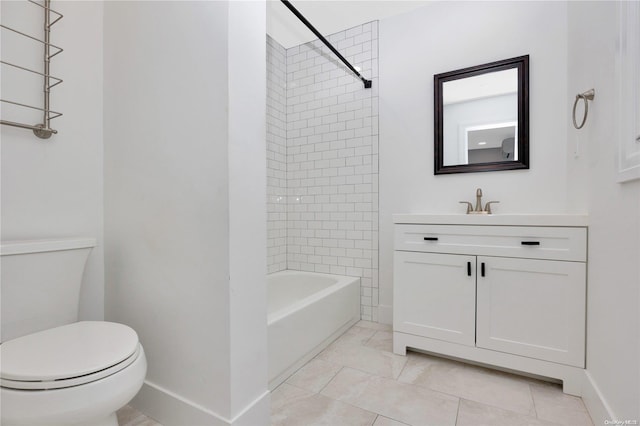 full bathroom with tile patterned flooring, vanity, toilet, and tiled shower / bath combo