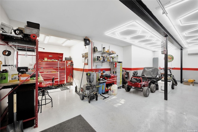 garage with an AC wall unit