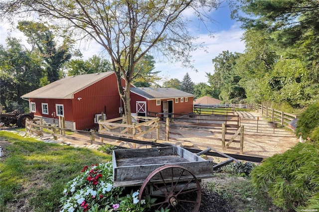 exterior space featuring an outbuilding