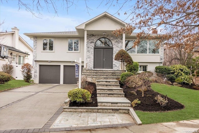 view of front of property with a garage