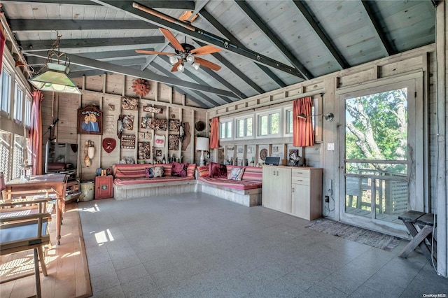 misc room featuring vaulted ceiling with beams, a healthy amount of sunlight, wood ceiling, and ceiling fan