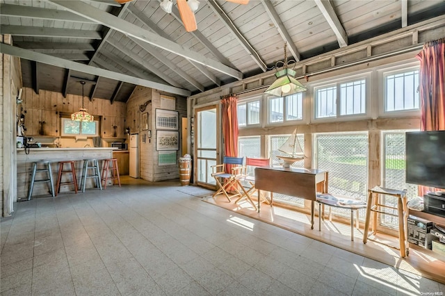 interior space featuring vaulted ceiling and wood ceiling