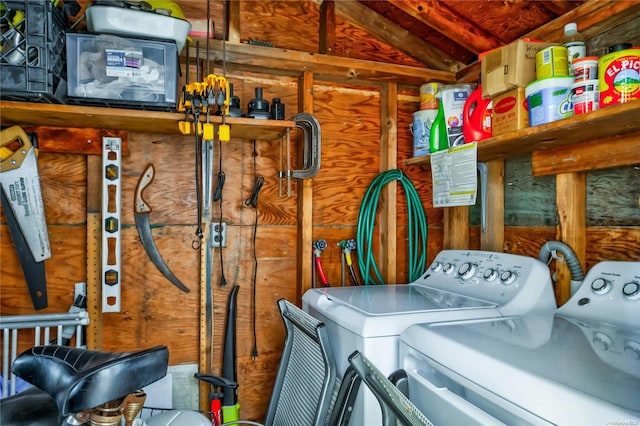 clothes washing area with washing machine and clothes dryer